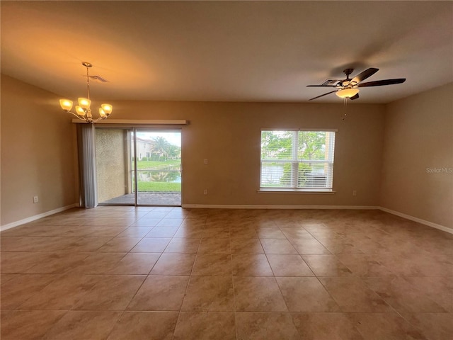 3724 Crofton Ct, Fort Myers, FL 33916 - empty room featuring a chandelier, light tile patterned floors, and ceiling fan