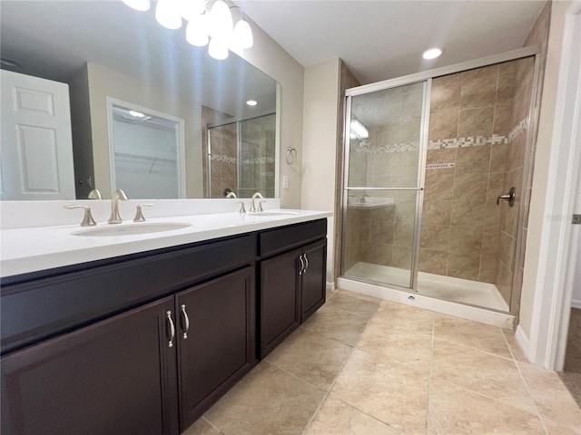 3724 Crofton Ct, Fort Myers, FL 33916 - full bath featuring a stall shower, double vanity, tile patterned flooring, a walk in closet, and recessed lighting