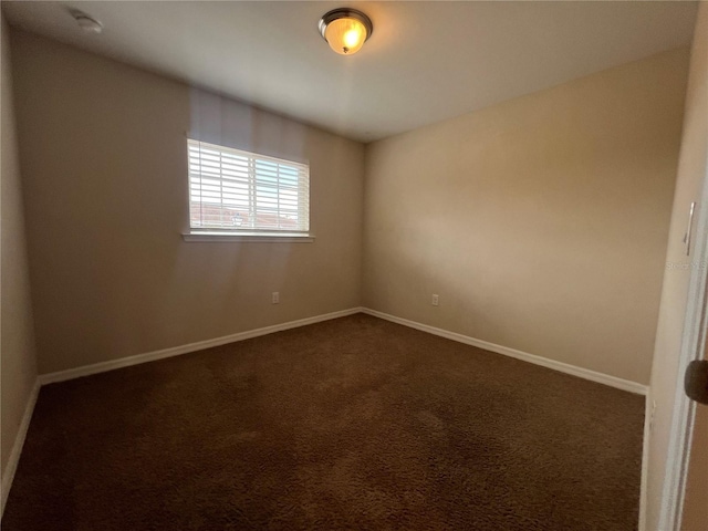 3724 Crofton Ct, Fort Myers, FL 33916 - unfurnished room with dark colored carpet and a smoke detector