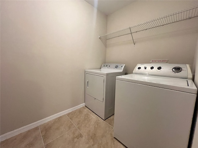 3724 Crofton Ct, Fort Myers, FL 33916 - washroom featuring independent washer and dryer and light tile patterned floors
