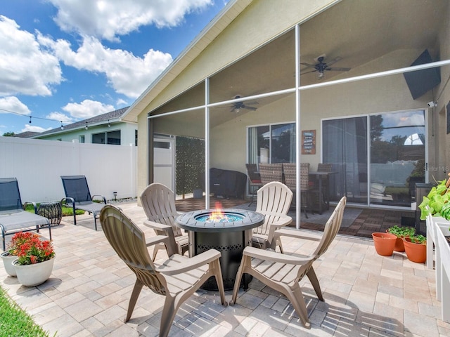 24811 Gun Smoke Dr, Land O Lakes, FL 34639 - view of patio / terrace with ceiling fan and an outdoor fire pit