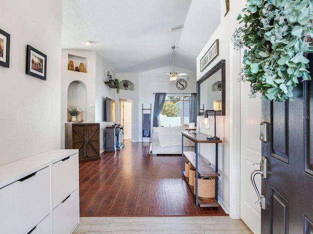 24811 Gun Smoke Dr, Land O Lakes, FL 34639 - foyer entrance with lofted ceiling, wood finished floors, and a ceiling fan