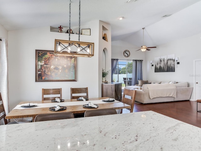 24811 Gun Smoke Dr, Land O Lakes, FL 34639 - dining room with lofted ceiling, wood finished floors, and a ceiling fan