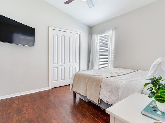 24811 Gun Smoke Dr, Land O Lakes, FL 34639 - bedroom featuring vaulted ceiling, dark wood-type flooring, a closet, and a ceiling fan