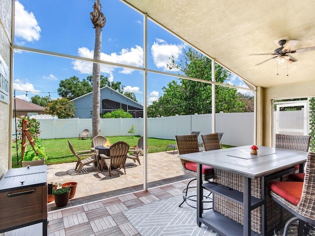 24811 Gun Smoke Dr, Land O Lakes, FL 34639 - fenced backyard with outdoor dining space, ceiling fan, and a patio area