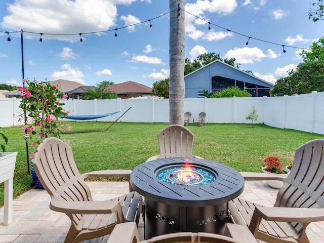 24811 Gun Smoke Dr, Land O Lakes, FL 34639 - fenced backyard with a patio area and a fire pit