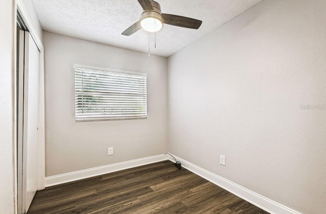 10215 N 23rd St, Tampa, FL 33612 - empty room featuring dark wood-style floors, a textured ceiling, and ceiling fan