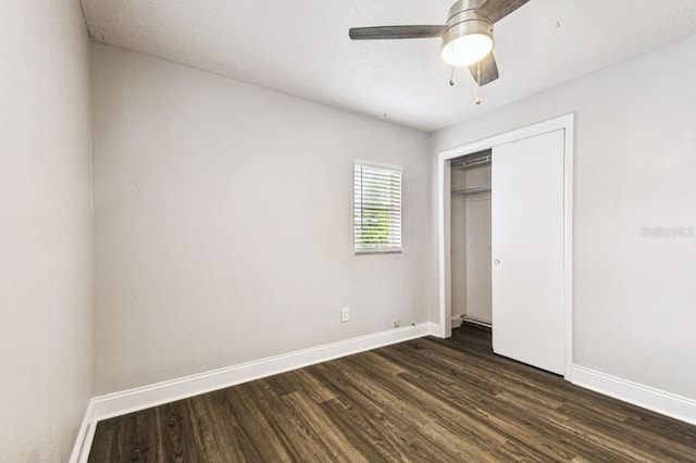 10215 N 23rd St, Tampa, FL 33612 - unfurnished bedroom featuring dark wood-style flooring, a closet, and a ceiling fan