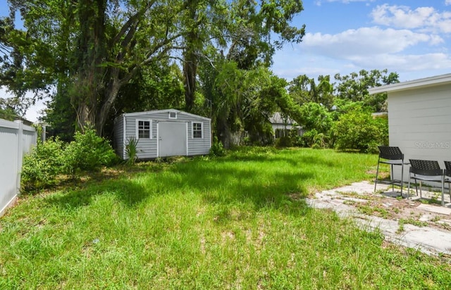 10215 N 23rd St, Tampa, FL 33612 - view of yard with a storage shed