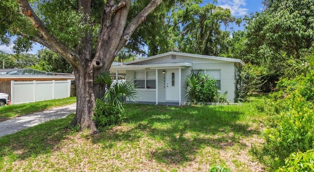 10215 N 23rd St, Tampa, FL 33612 - view of front of house with a porch and driveway