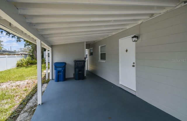10215 N 23rd St, Tampa, FL 33612 - view of patio / terrace with a carport