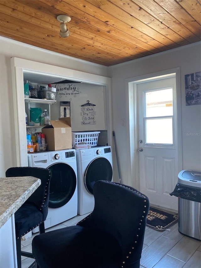 4219 Gray Squirrel Ln, New Port Richey, FL 34653 - laundry area featuring separate washer and dryer and wooden ceiling