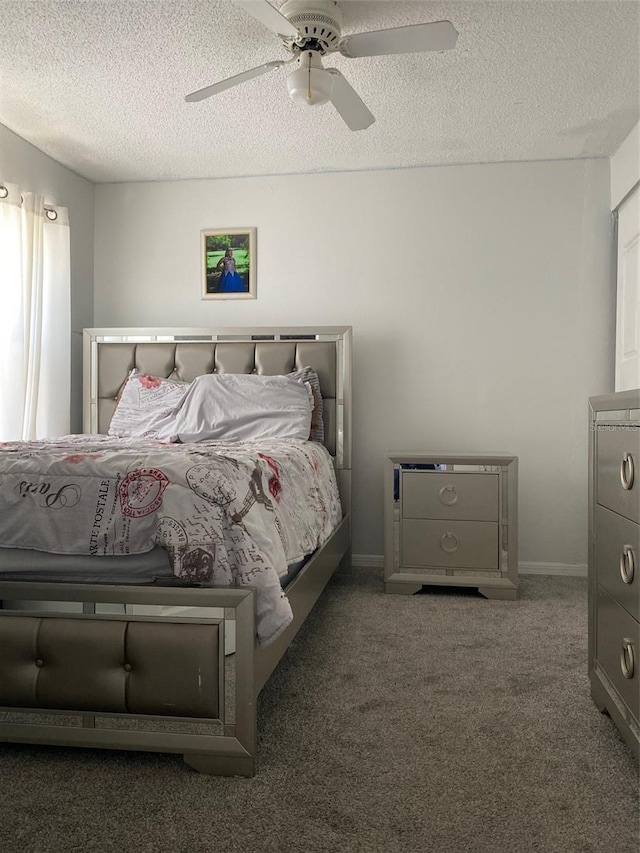 4219 Gray Squirrel Ln, New Port Richey, FL 34653 - carpeted bedroom with a textured ceiling and a ceiling fan