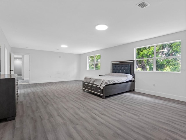 2440S Wallace Rd, Bartow, FL 33830 - bedroom featuring baseboards and wood finished floors