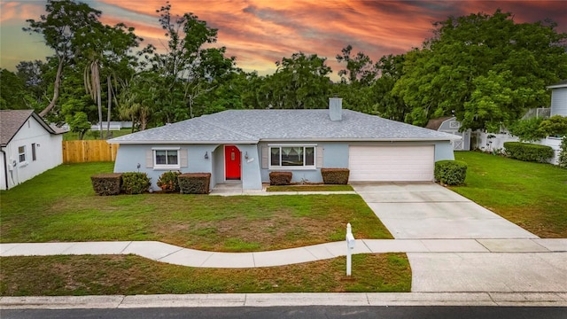 2914 Forest Cir, Seffner, FL 33584 - view of front of house with an attached garage, stucco siding, concrete driveway, a chimney, and a shingled roof