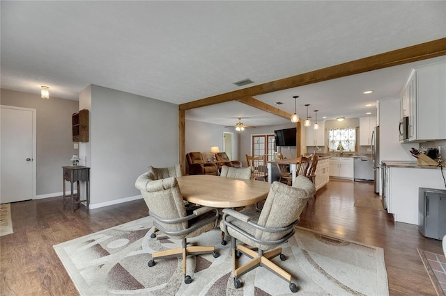 2914 Forest Cir, Seffner, FL 33584 - dining room featuring dark wood-style floors, a ceiling fan, recessed lighting, and beam ceiling