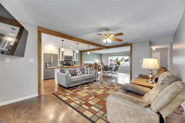 2914 Forest Cir, Seffner, FL 33584 - living room with wood finished floors and ceiling fan
