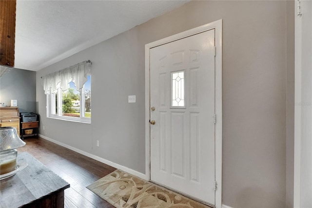 2914 Forest Cir, Seffner, FL 33584 - foyer entrance featuring baseboards and wood finished floors