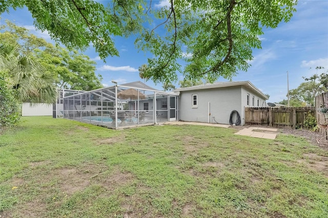 2914 Forest Cir, Seffner, FL 33584 - back of house featuring a fenced backyard, a patio area, and a lanai