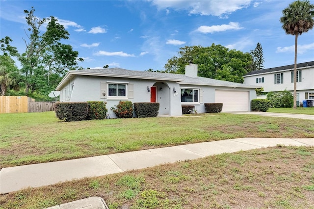 2914 Forest Cir, Seffner, FL 33584 - view of front facade featuring an attached garage, driveway, a chimney, and stucco siding