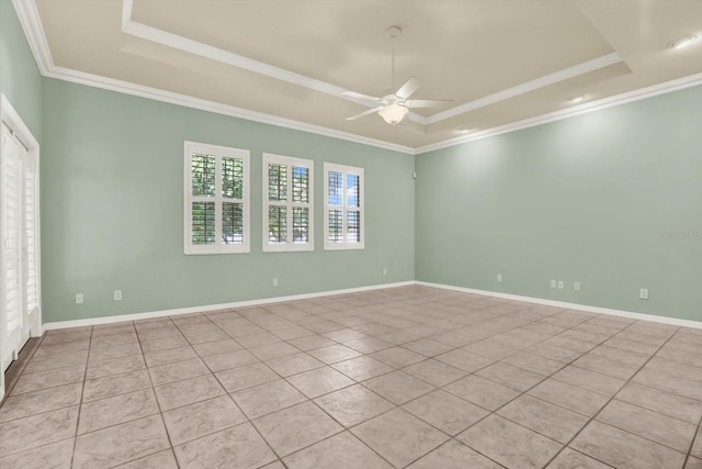 13321 Lewis Raulerson Rd, Dover, FL 33527 - tiled spare room with a raised ceiling, a ceiling fan, and ornamental molding