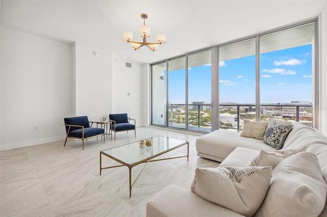 777 3rd Ave N Unit 1406, Saint Petersburg, FL 33701 - living room featuring a chandelier, expansive windows, and a view of city
