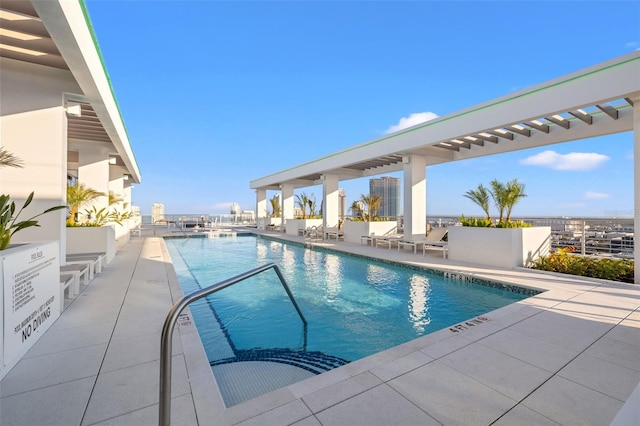 777 3rd Ave N Unit 1406, Saint Petersburg, FL 33701 - community pool featuring a patio