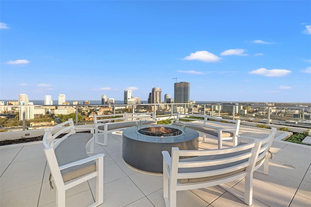 777 3rd Ave N Unit 1406, Saint Petersburg, FL 33701 - view of patio with a view of city and an outdoor fire pit