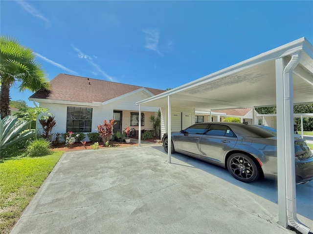 10636 Millriver Dr, New Port Richey, FL 34654 - view of property exterior with a carport