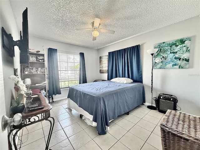 10636 Millriver Dr, New Port Richey, FL 34654 - bedroom with light tile patterned floors, a textured ceiling, and ceiling fan