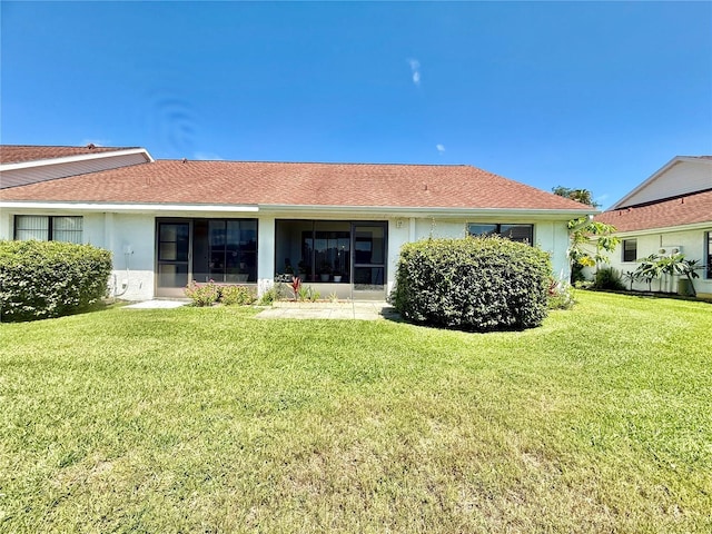 10636 Millriver Dr, New Port Richey, FL 34654 - back of house featuring a yard