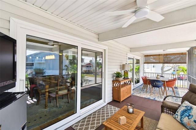 616 2nd St, Indian Rocks Beach, FL 33785 - sunroom / solarium with a ceiling fan, outdoor dining area, and beamed ceiling