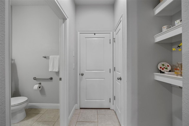 5813 Grand Sonata Ave, Lutz, FL 33558 - bathroom featuring tile patterned flooring and toilet