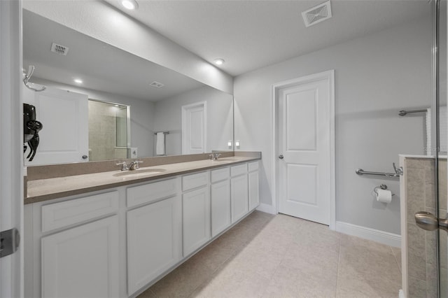 5813 Grand Sonata Ave, Lutz, FL 33558 - full bathroom featuring double vanity, tile patterned flooring, recessed lighting, and an enclosed shower
