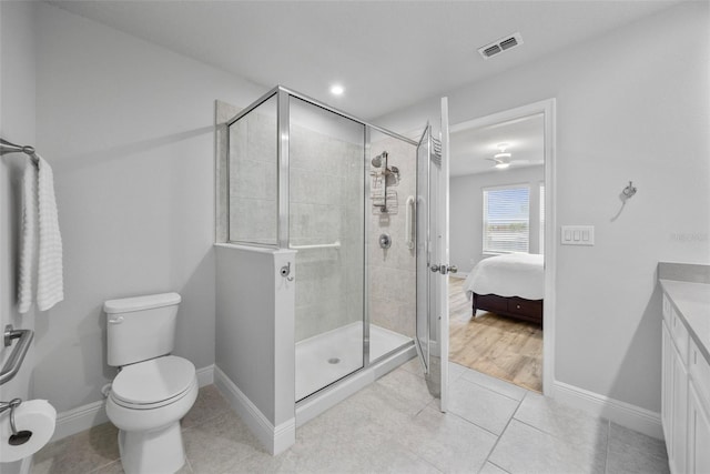 5813 Grand Sonata Ave, Lutz, FL 33558 - ensuite bathroom featuring a stall shower, vanity, and tile patterned floors