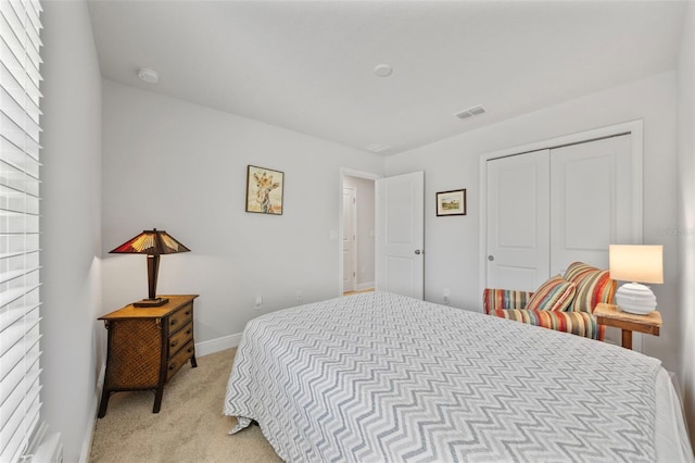 5813 Grand Sonata Ave, Lutz, FL 33558 - bedroom featuring light colored carpet, a closet, and multiple windows
