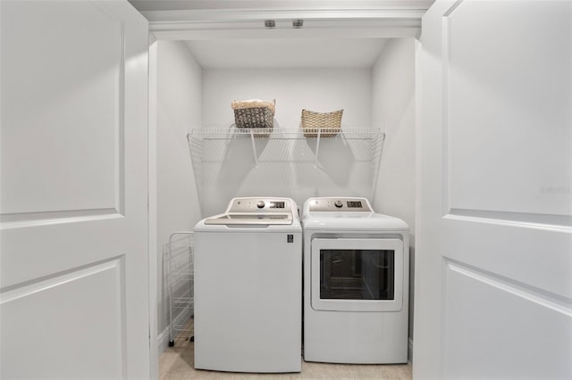 5813 Grand Sonata Ave, Lutz, FL 33558 - laundry area featuring washer and clothes dryer