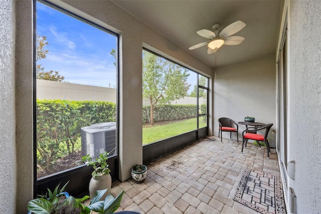 5813 Grand Sonata Ave, Lutz, FL 33558 - sunroom with a ceiling fan