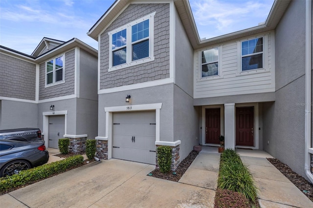 5813 Grand Sonata Ave, Lutz, FL 33558 - view of property with stucco siding, a garage, and driveway