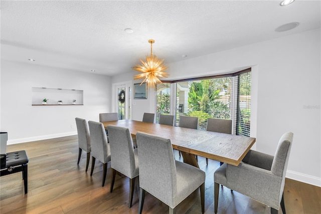 4096 38th St S, Saint Petersburg, FL 33711 - dining room featuring a chandelier, wood finished floors, and recessed lighting