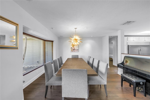 4096 38th St S, Saint Petersburg, FL 33711 - dining area with dark wood finished floors and a chandelier