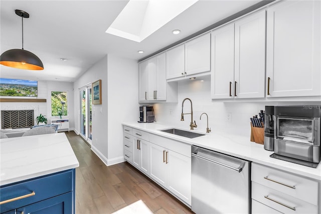 4096 38th St S, Saint Petersburg, FL 33711 - kitchen with dishwasher, open floor plan, recessed lighting, dark wood-style flooring, and white cabinets