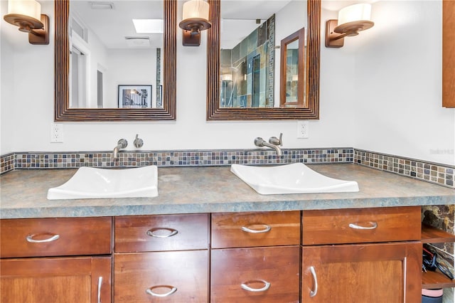 4096 38th St S, Saint Petersburg, FL 33711 - full bath with double vanity and backsplash