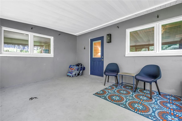 4096 38th St S, Saint Petersburg, FL 33711 - view of exterior entry with stucco siding and a patio