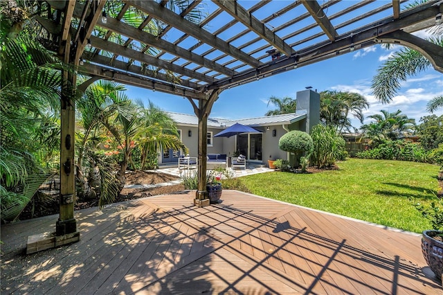 4096 38th St S, Saint Petersburg, FL 33711 - view of patio / terrace featuring a wooden deck, a pergola, and french doors
