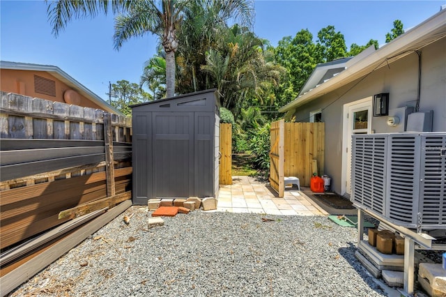 4096 38th St S, Saint Petersburg, FL 33711 - fenced backyard featuring a shed and a patio