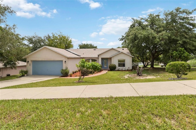 818 Cherry Laurel St, Minneola, FL 34715 - single story home featuring an attached garage, concrete driveway, a front lawn, and stucco siding