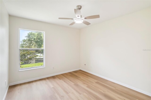 818 Cherry Laurel St, Minneola, FL 34715 - spare room featuring light wood-style floors and ceiling fan