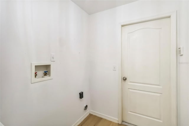 818 Cherry Laurel St, Minneola, FL 34715 - washroom with hookup for a washing machine and light wood-style floors