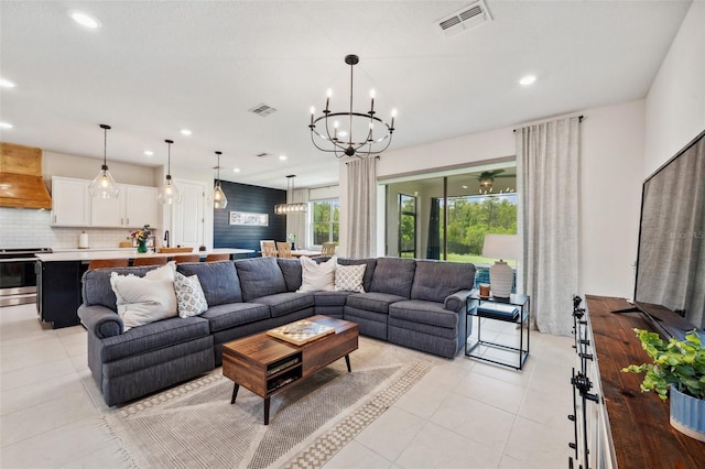 18144 Frame Bnd, Land O Lakes, FL 34638 - living room with a chandelier, light tile patterned flooring, and recessed lighting